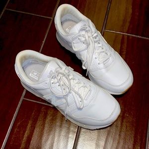 White New Balance 311 athletic shoes, size 7 1/2.